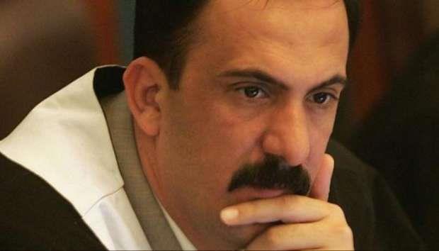 "طرد صدام حسين وأرسله للانفرادي".. وفاة قاضي عراقي بكورونا