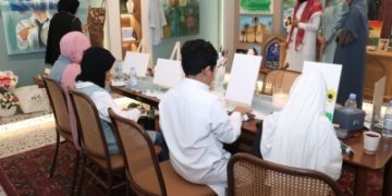 'فنّ السعادة' يرسم البهجة بوسط العوامية بالقطيف